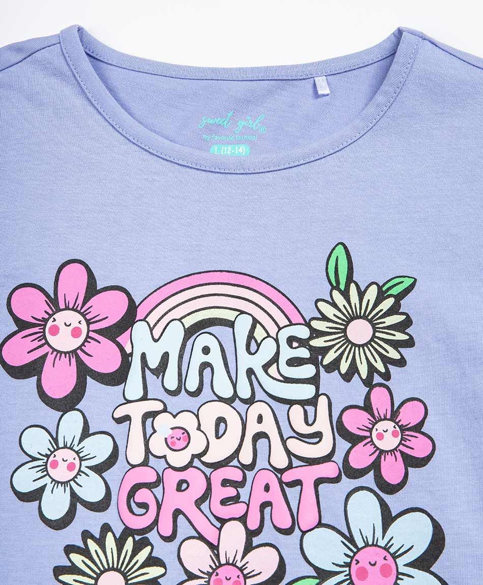 Remera ni&ntilde;a frase flores