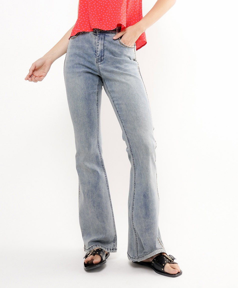Jeans mujer tachas redondas flare