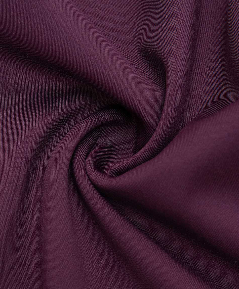 Calza deportiva mujer stretch burdeo