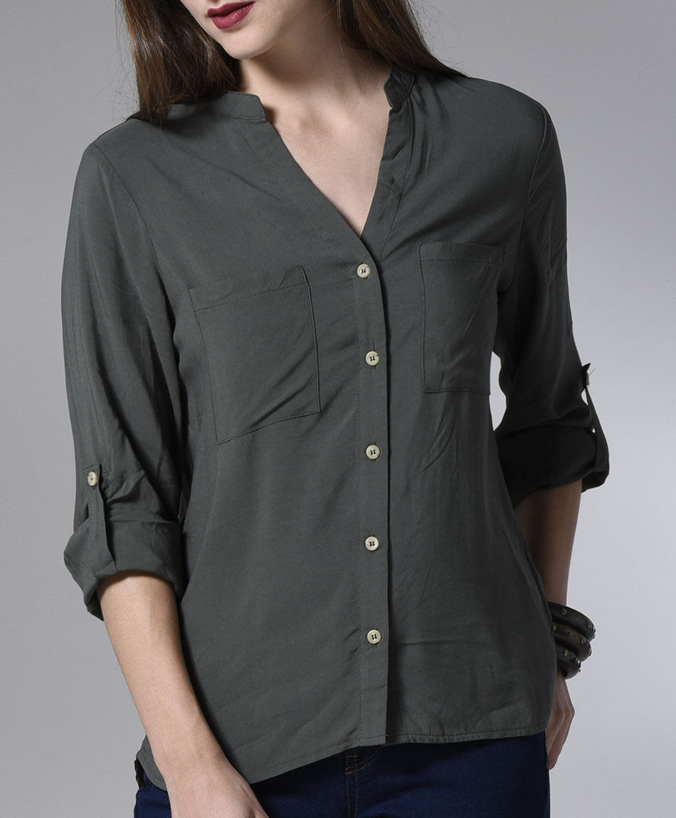 Blusa camisera bolsillos