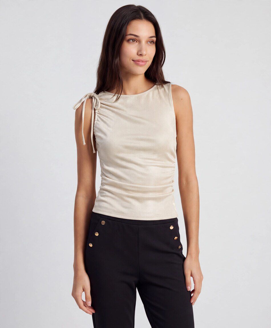 Remera mujer dorada lazo