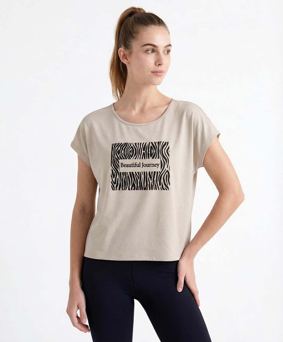Remera deportiva mujer manga casquillo beige