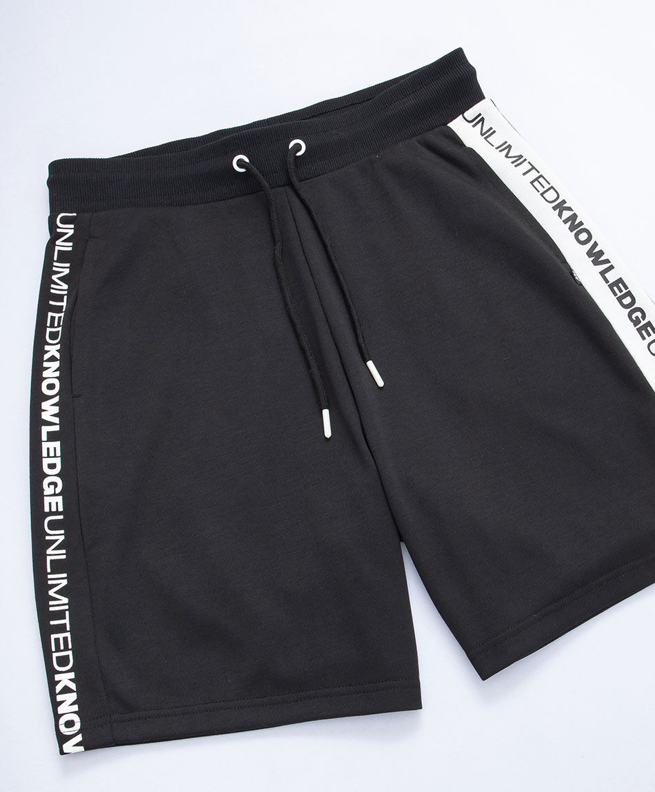 Short deportivo hombre frase lateral