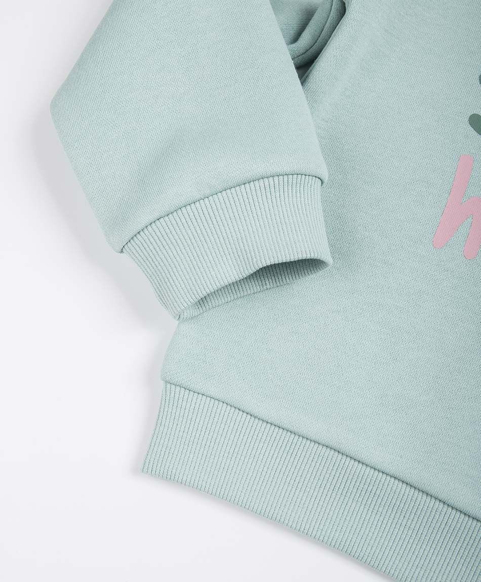 Set buzo beb&eacute; frase verde