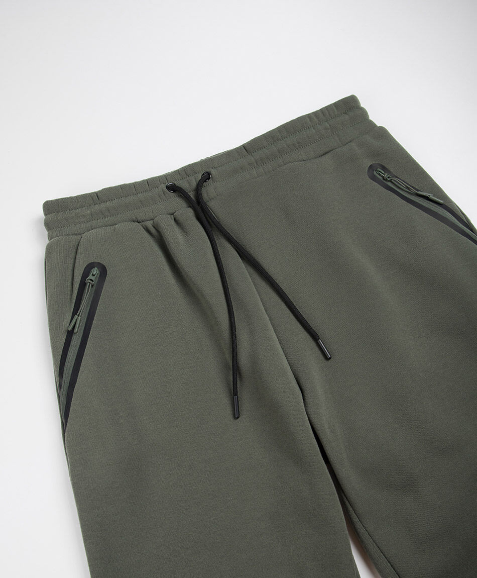 Pantal&oacute;n deportivo hombre verde cierres