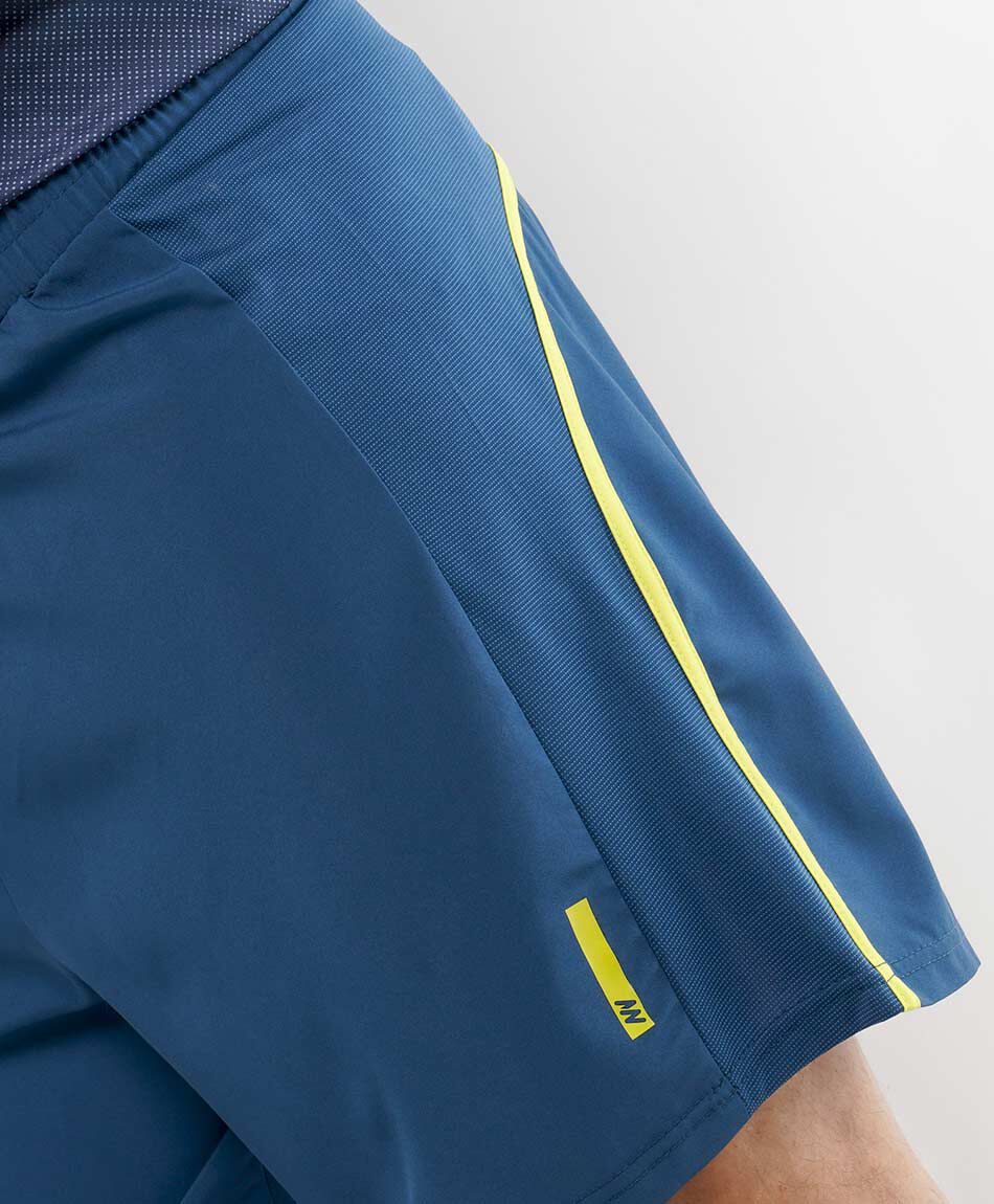 Short deportivo hombre piping amarillo