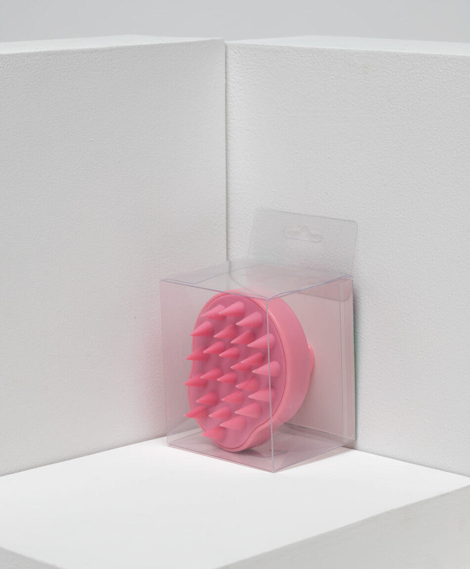 Masajeador capilar rosado