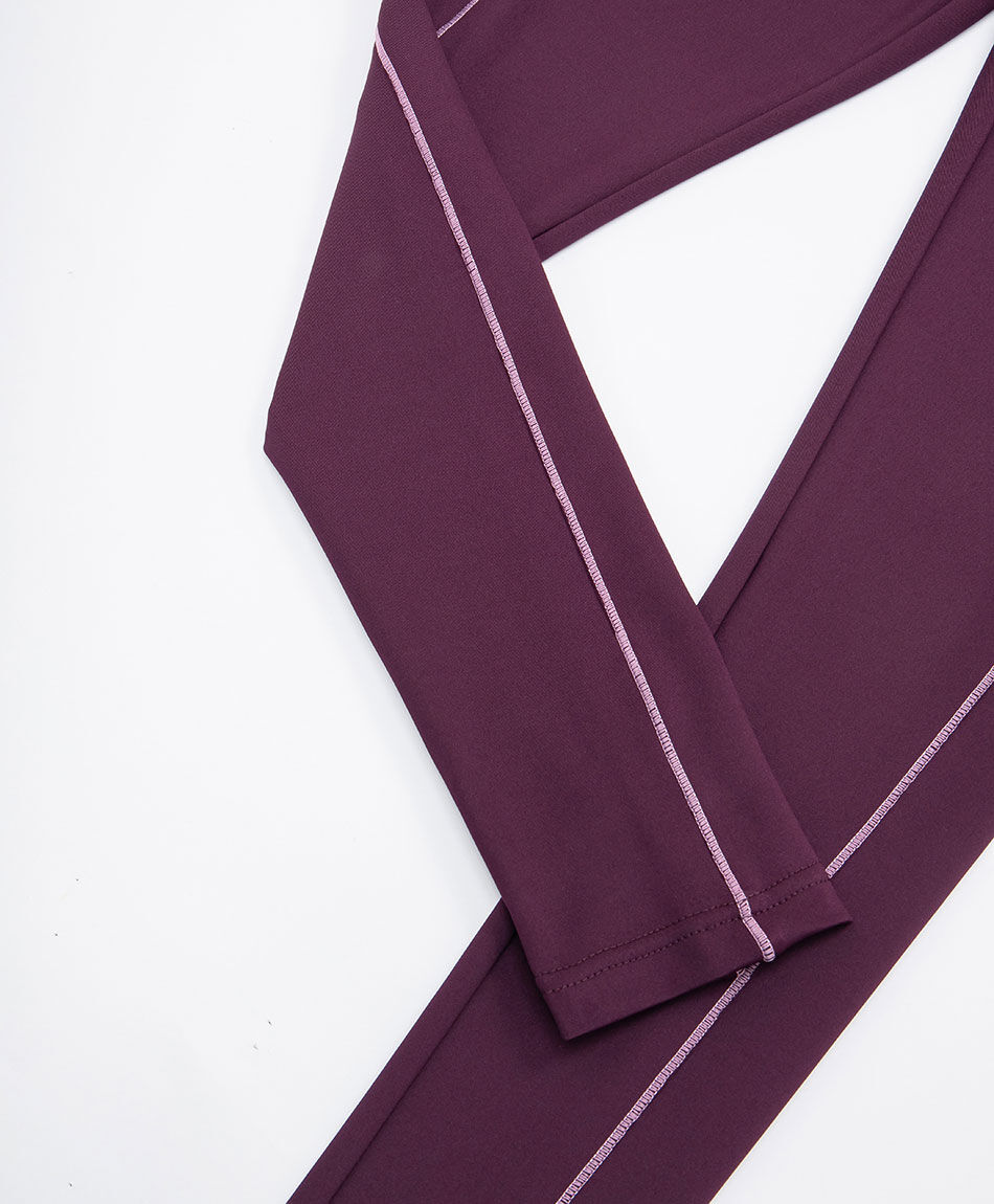 Calza deportiva mujer stretch burdeo