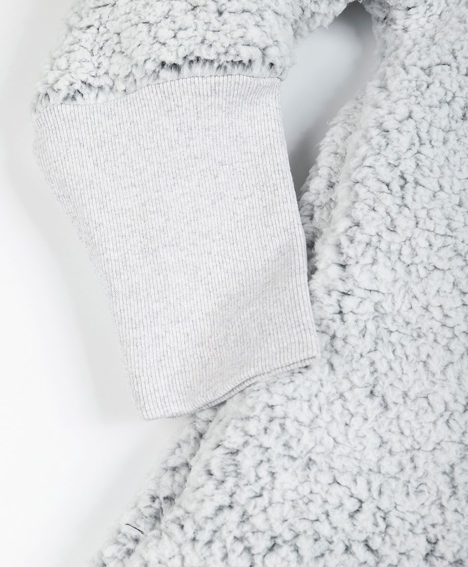 Bata manta mujer pompones oversize