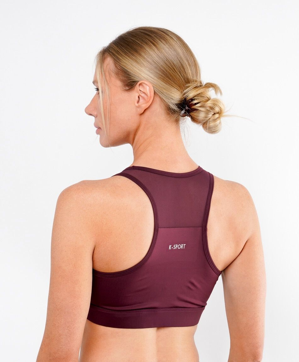 Top deportivo mujer burdeo