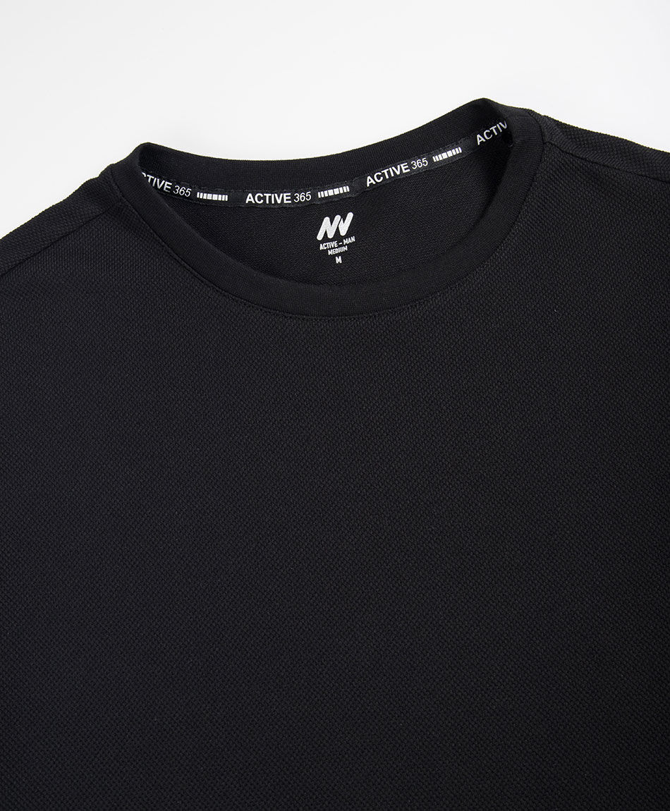 Remera deportiva texturizada negra