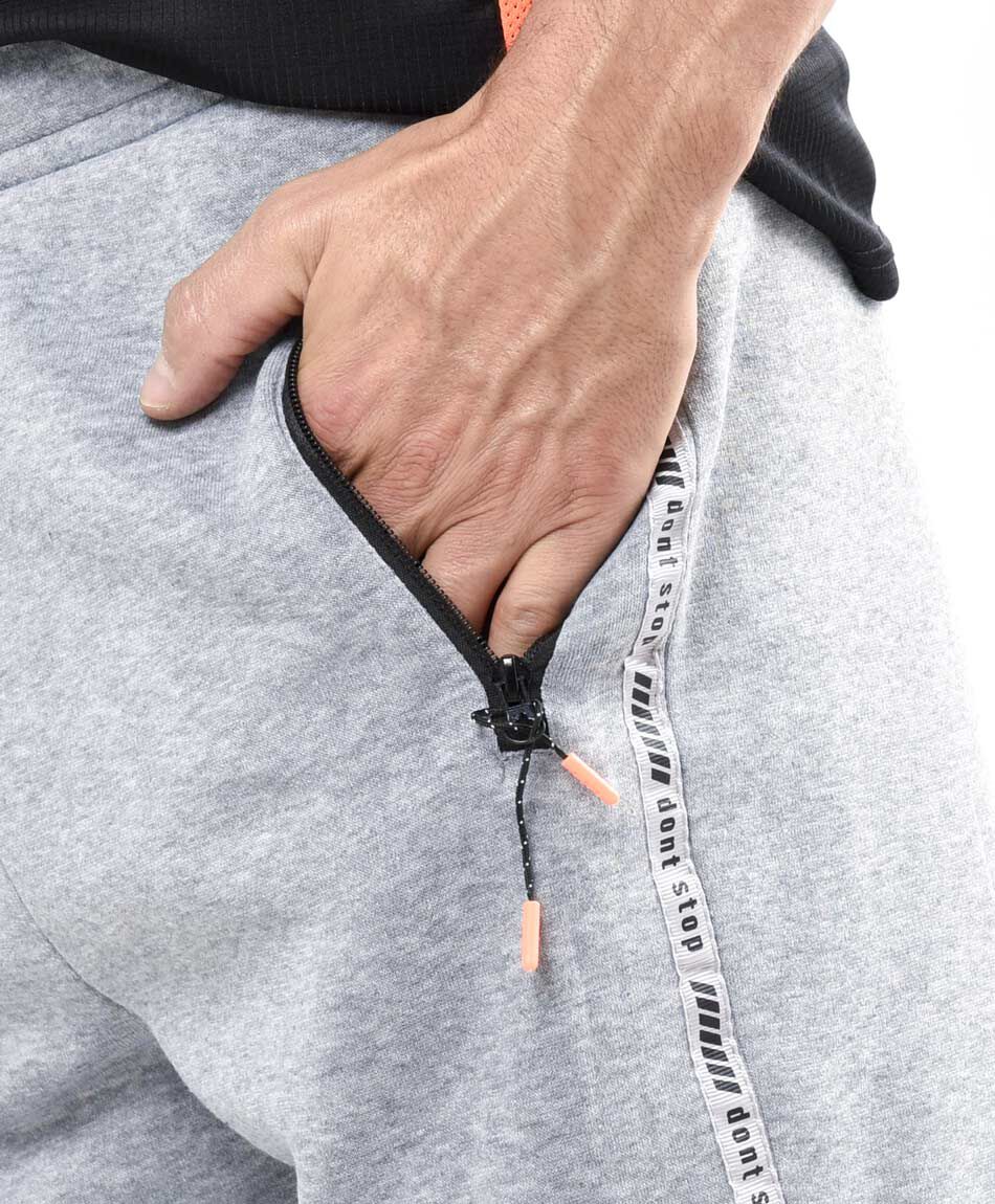 Pantal&oacute;n deportivo hombre gris cierres