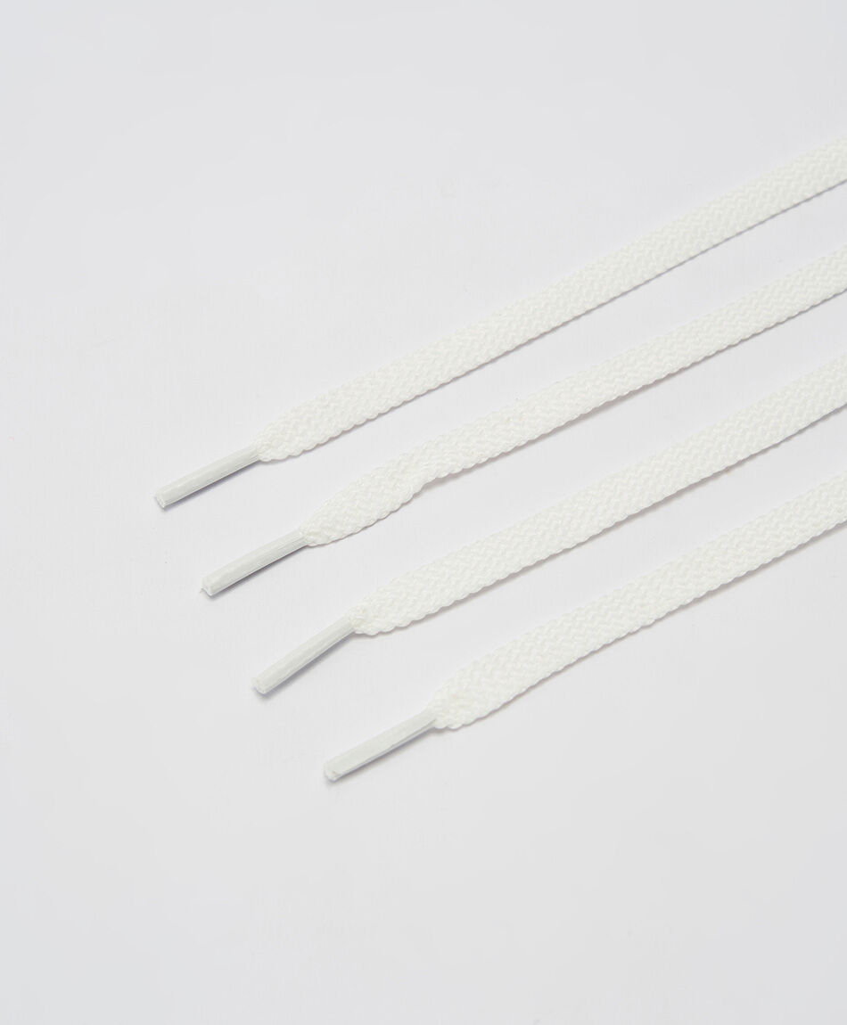 Cord&oacute;n zapatilla blanco