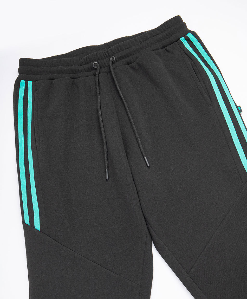 Pantal&oacute;n deportivo hombre l&iacute;neas calipso
