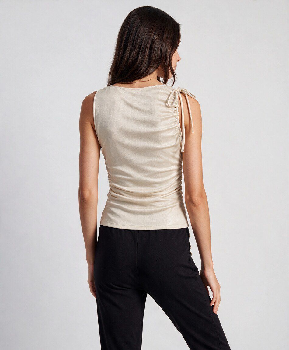 Remera mujer dorada lazo