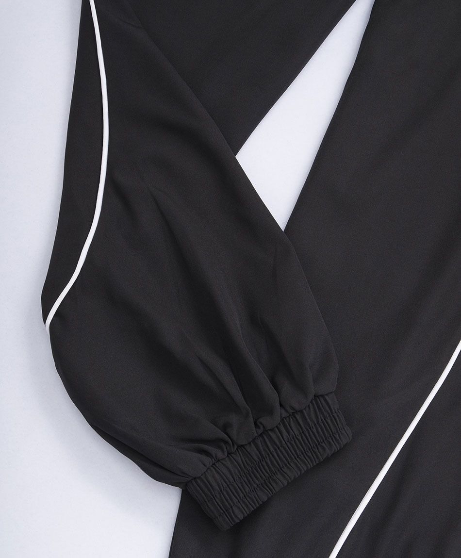 Pantal&oacute;n deportivo mujer lineas blancas