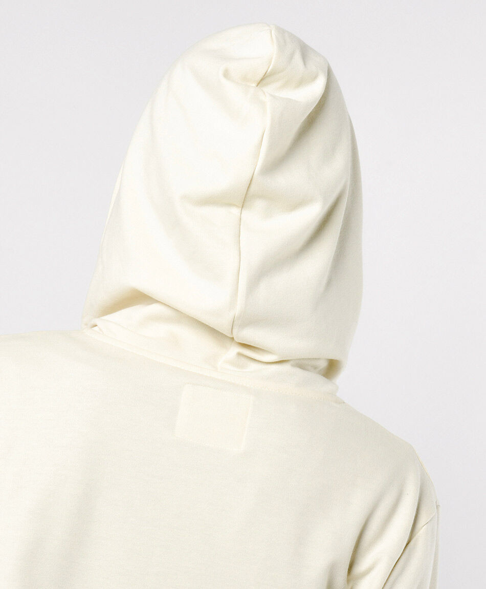 Buzo mujer cl&aacute;sico beige