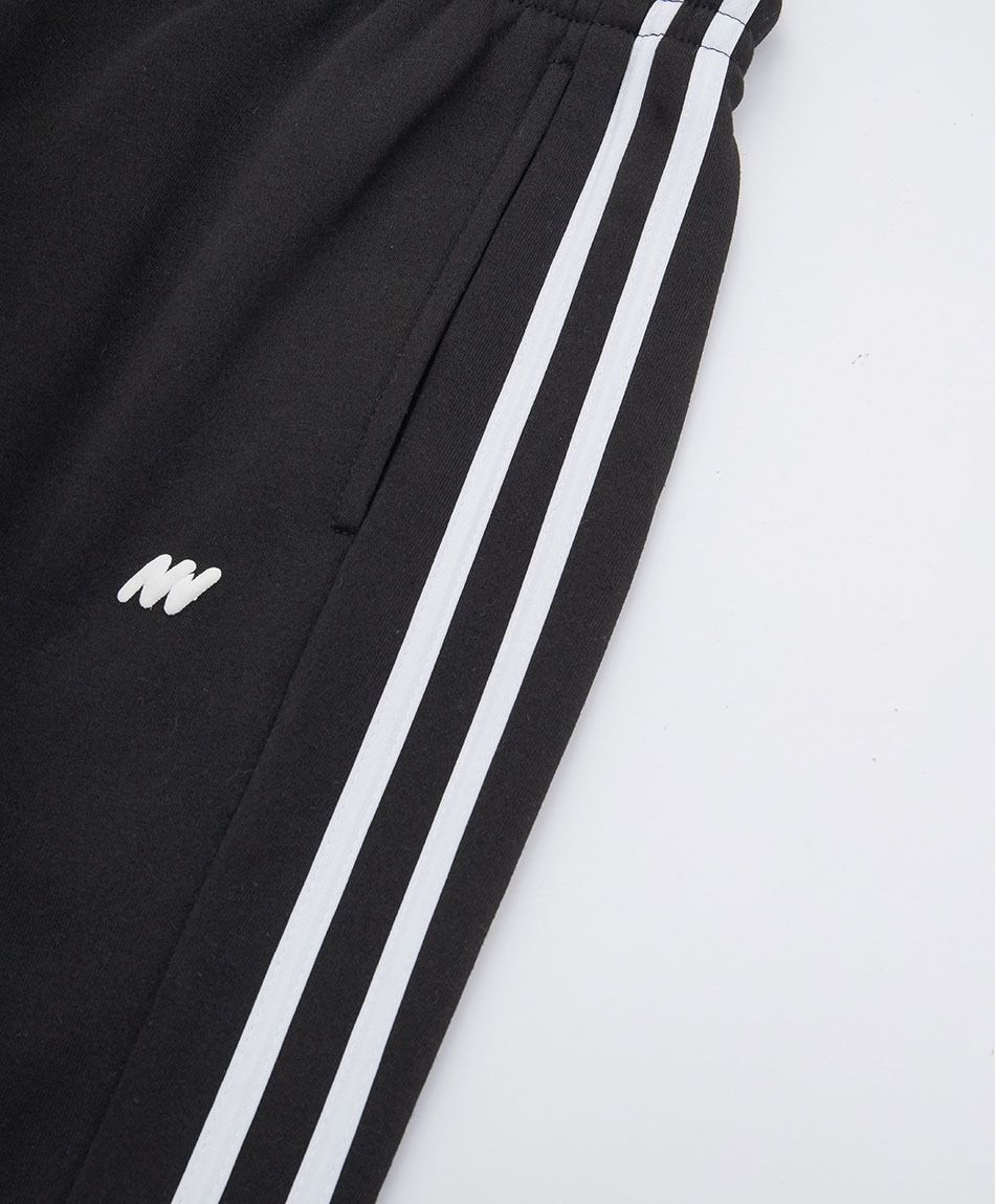 Pantal&oacute;n deportivo hombre negro l&iacute;nea doble