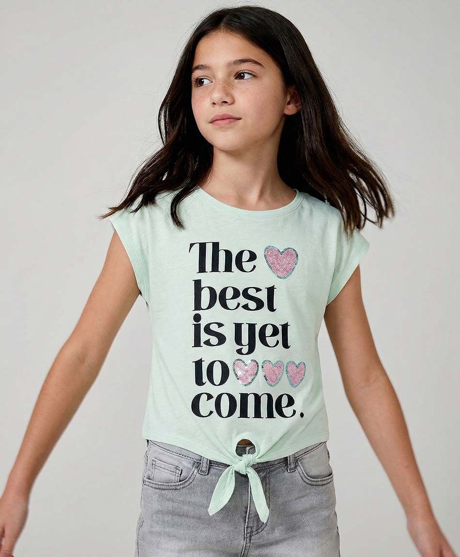 Remera ni&ntilde;a frase nudo