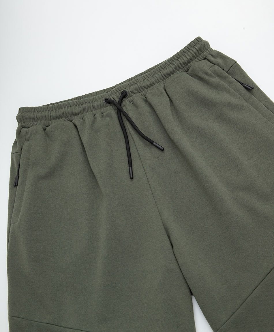 Short deportivo hombre liso costuras