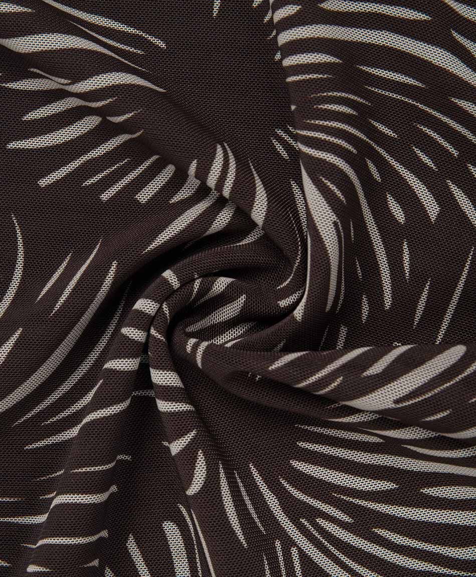 Remera mujer top asim&eacute;trica accesorio