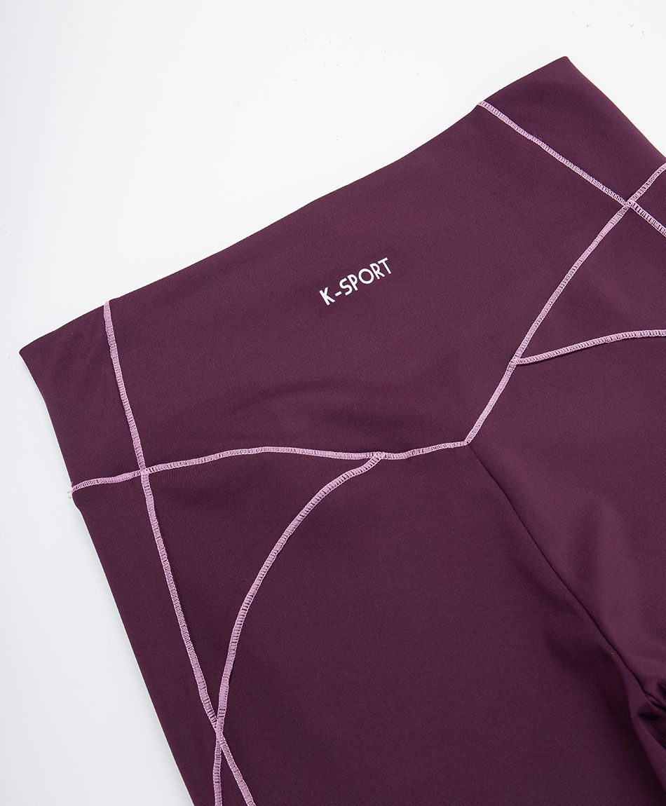 Calza deportiva mujer stretch burdeo